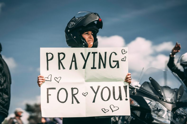 man in black helmet riding motorcycle